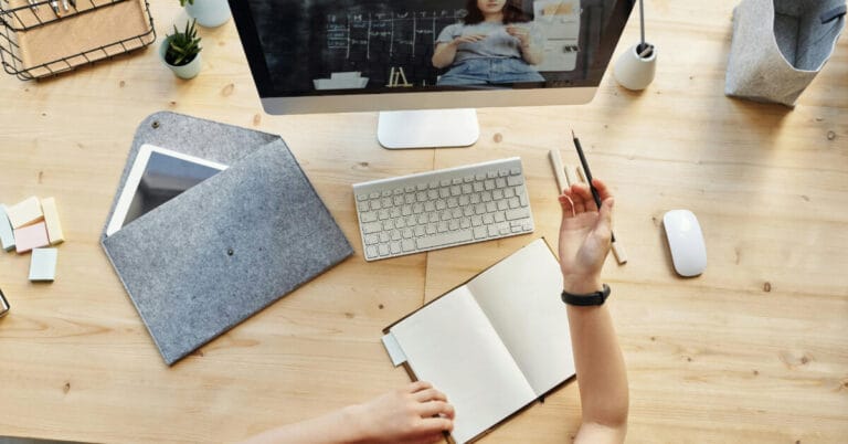 Person studying behind a computer