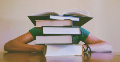 Books in front of student