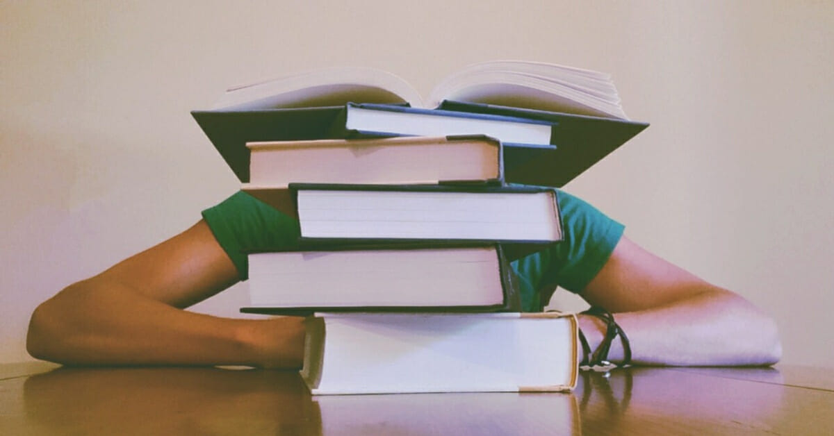 Books in front of student