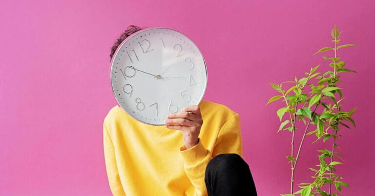 Person with clock in front of their head