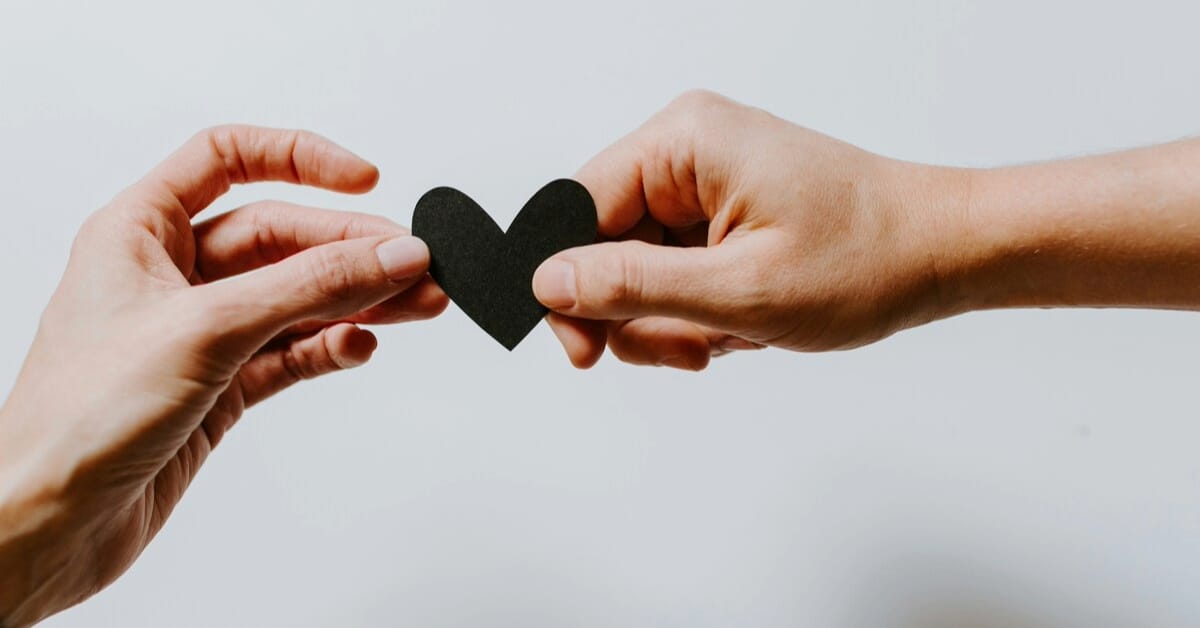 Symbolic image of hands and a heart for a good support system