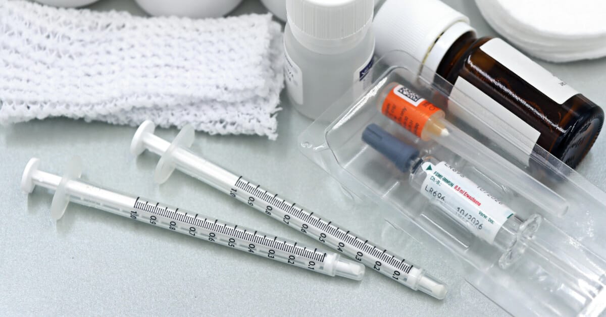 Immunology course blog banner Arrangement of medical tools and vaccines