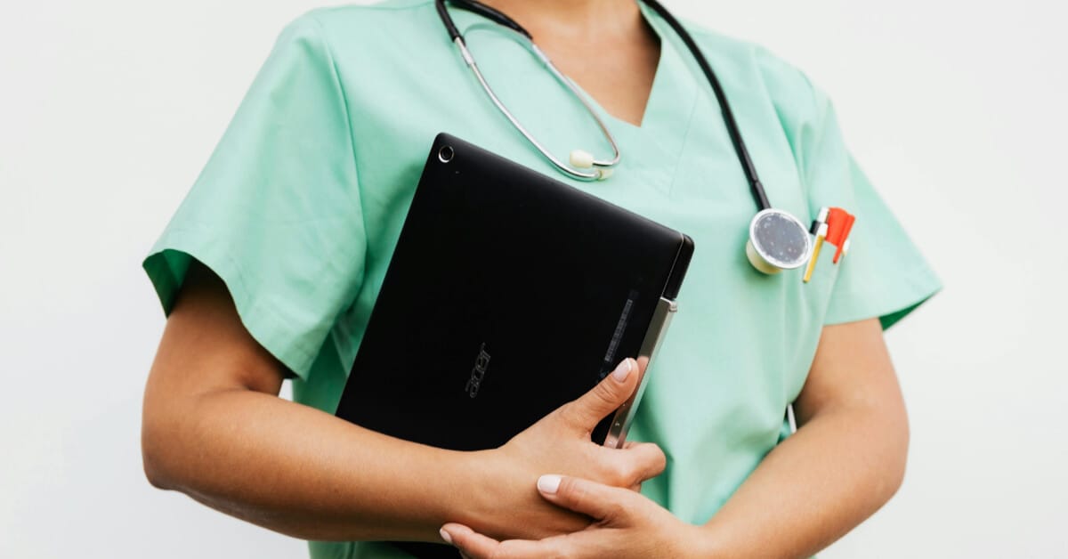 Nurse holding a notepad
