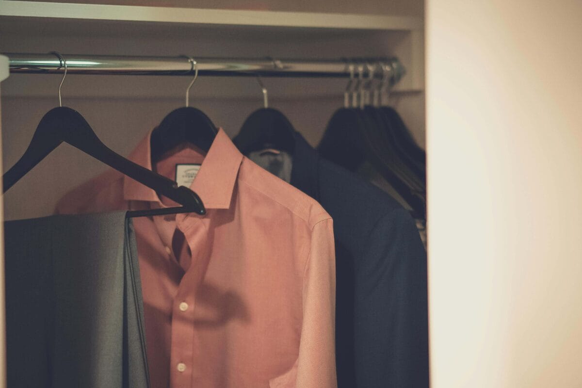 Pexels thatguycraig000 1682699 A pant suit hanging in a closet